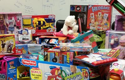 IQ Inc.'s 2015 Toys for Tots donation
