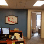 Behind the front desk